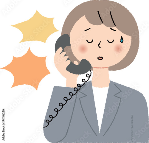 電話で怒鳴られるスーツの女性