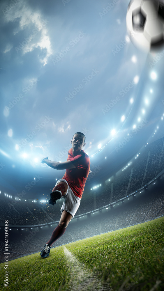 Fototapeta premium Football player is kicking a ball in the stadium. An imaginary stadium is modelled and rendered.