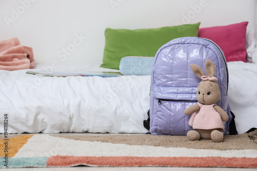 Lilac backpack with toy bun...