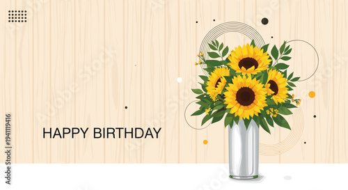 Beautiful bouquet of sunflowers in a tall silver vase set against a light wooden background for a birthday card.