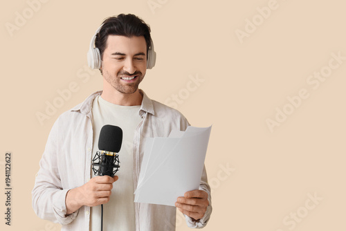 Male radio presenter with p...