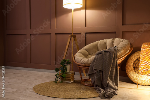 Comfortable armchair and gl...
