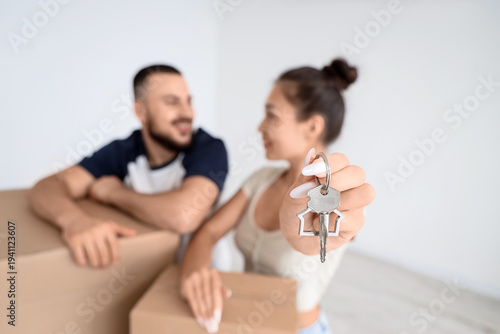 Young couple with key from ...