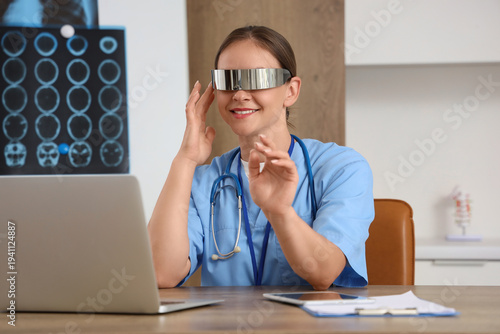 Female doctor in goggles us...