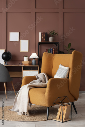 Comfortable armchair and bo...