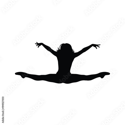 Silhouette of a Woman Dancing in Mid Air with Arms Outstretched and Legs in Splits
