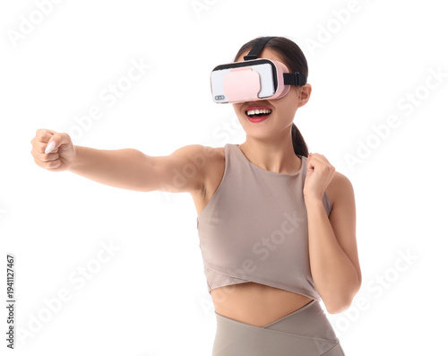 Sporty young woman in VR gl...