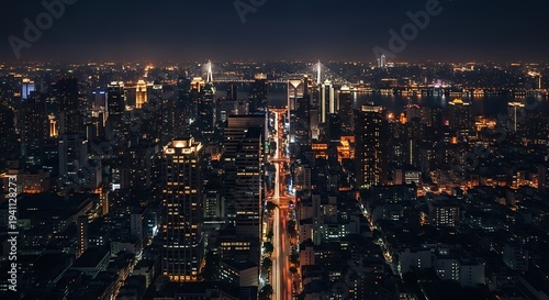 Wallpaper Mural Elevated night view showcasing a cityscape illuminated with bright lights, a bridge, and a dark sky Torontodigital.ca
