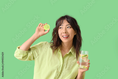 Young Asian woman with citr...
