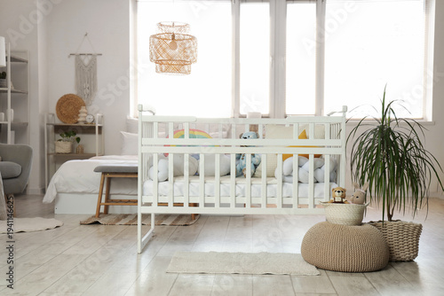 Interior of light bedroom w...