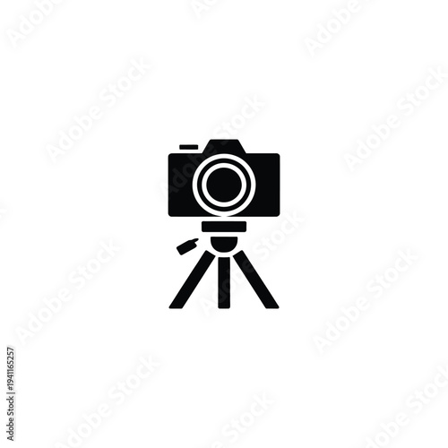 Solid fill of a black camera mounted on a tripod