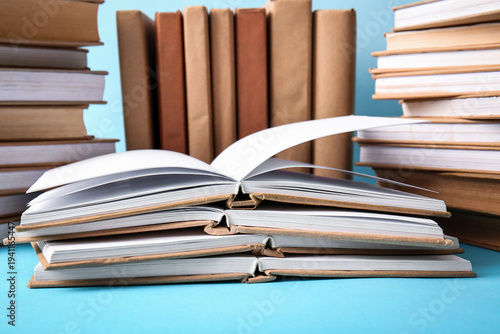 Many books on blue backgrou...