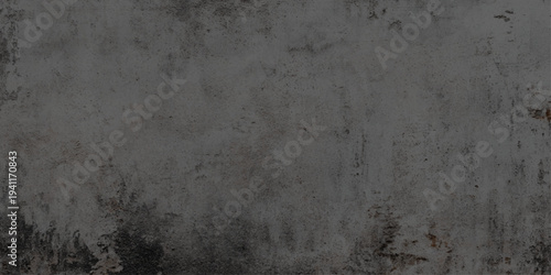 Dark grey concrete wall texture with weathered cement surface includes natural imperfections, cracks, and dark atmospheric stains for urban-style designs, architectural mockups.
