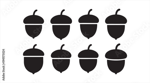 Black acorn icon pack showing oak seed silhouettes in simple style