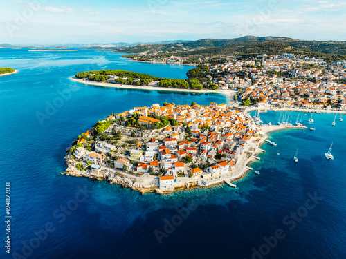 Bild auf Leinwand Aerial view of the historic town of Primosten on a peninsula, surrounded by crystal clear turquoise Adriatic sea, Dalmatia, Croatia