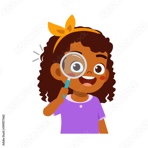 Happy curious Black girl looking through magnifying glass smiling broadly wearing a purple shirt