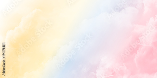 Beautiful fluffy white clouds on pastel clear sky