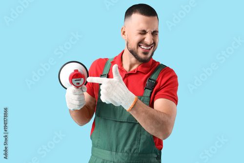 Irritated male worker point...