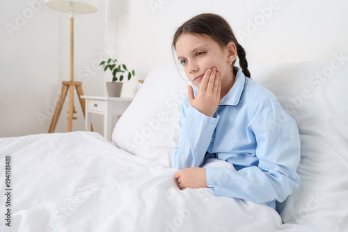 Cute girl suffering from to...
