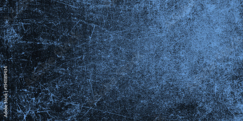 Dark blue grunge texture background with scratched metal effect industrial weathered surface a distressed metal or worn concrete wall design.