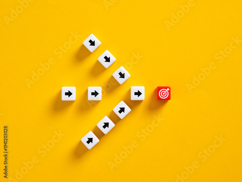 Arrows reaching target goal on yellow background