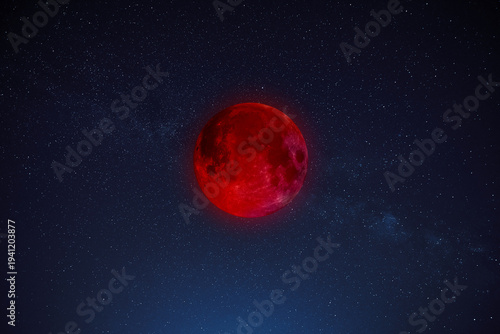 Lunar eclipse on a starry Milky Way background.