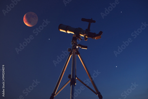 Astronomy telescope for observing Lunar eclipse, stars, planets and other celestial Milky Way objects.