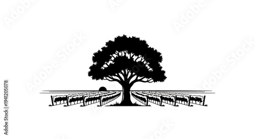 Timeless vineyard landscape with a majestic oak tree silhouette against a rising sun horizon