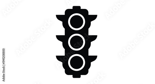 A simple black silhouette of a traffic light with three circular lights
