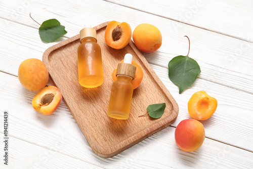 Bottles of cosmetic oil wit...