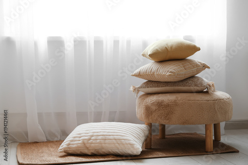 Cushions on pouf and floor ...