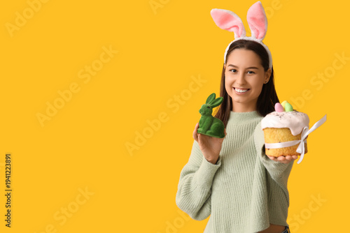Pretty young woman with bun...