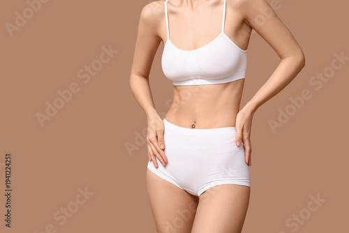 Young woman in underwear on...