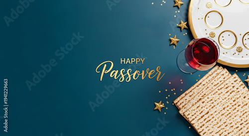 Flat lay composition of passover seder plate with matzah bread and wine glass surrounded by gold stars. Happy passover greeting in gold lettering on blue background. Jewish holiday tradition and