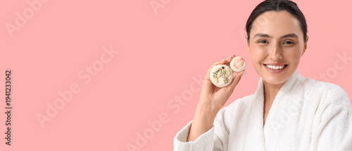 Smiling young woman with ba...