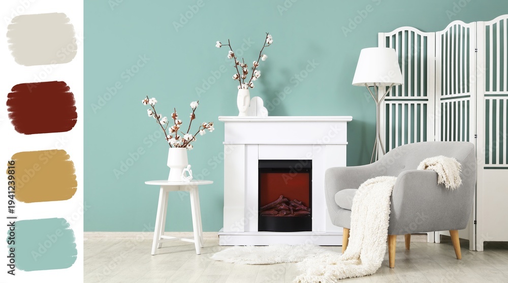 Obraz premium Interior of stylish living room with grey armchair, white fireplace and cotton flowers. Different color patterns