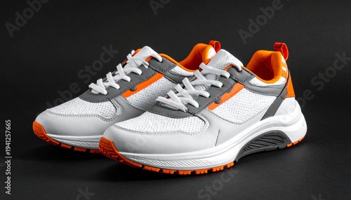 White and Orange Athletic Shoes