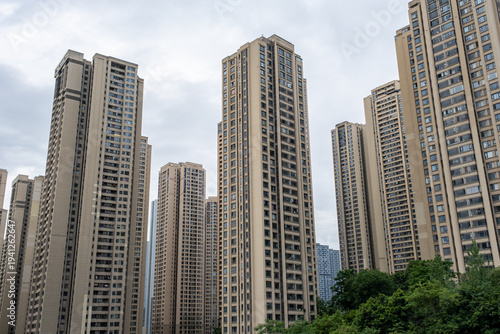 apartment building with balconies and laundry drying