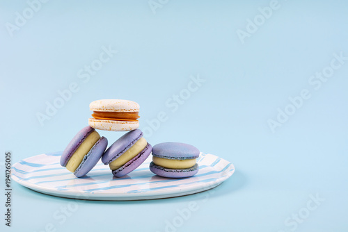 Traditional French almond cookies with sweet filling. Assorted colorful macarons