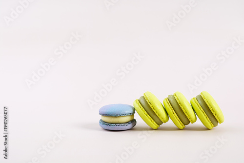 Traditional French almond cookies with sweet filling. Assorted colorful macarons