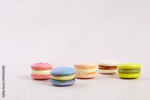 Traditional French almond cookies with sweet filling. Assorted colorful macarons