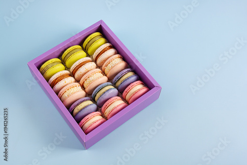 Traditional French almond cookies with sweet filling. Assorted colorful macarons