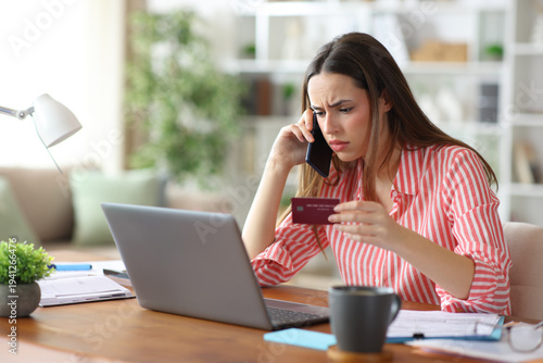 Quadro su tela Annoyed self employed making call paying online