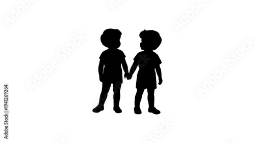 Silhouette of two little children or friends holding hands