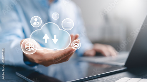 Wallpaper Mural Businessman using Cloud computing service to secure data synchronization concept for online file storage, upload, backup, sync data, download transfer, and remote access services. Torontodigital.ca