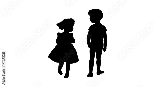 Silhouette of a Young Boy and Girl Standing