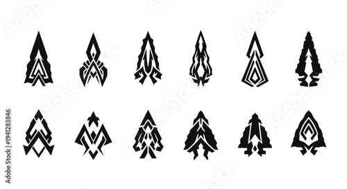 Set of abstract black tribal arrowhead symbols on white background for design and decoration