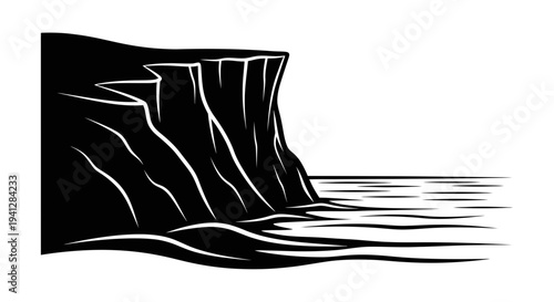 Dramatic Black and White Cliff Face Meets the Ocean Waves