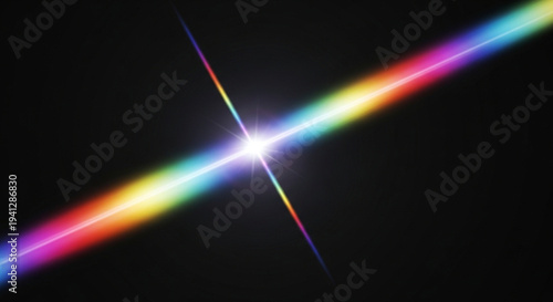 Vibrant rainbow light beam with a bright white starburst effect on a black background creating a colorful diagonal streak