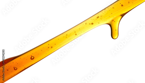 Amber liquid pouring, cascading, with bubbles, against a black backdrop